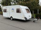 Knaus Sudwind 450 FU Mover en losse luifel  foto: 2