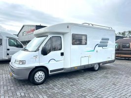 Hymer Tramp 574 vastbed/L-zit/6-m/122pk 