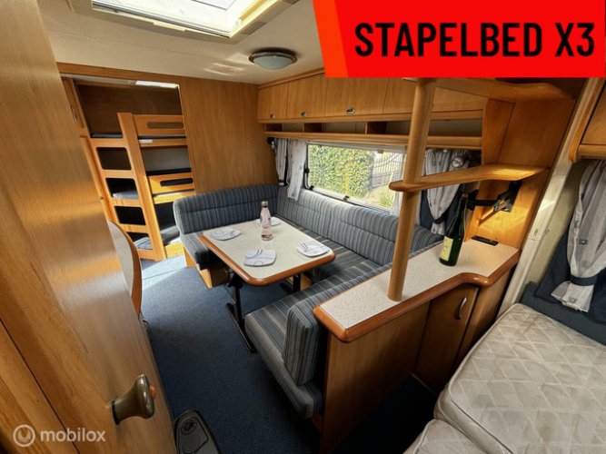 Hobby 560 KMFE 3X stapelbed rondzit vastbed issabella tent foto: 6