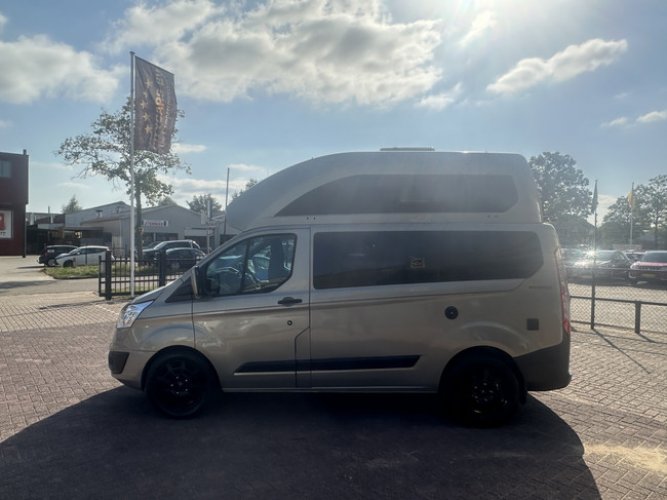 Westfalia Ford Nugget plus automaat buscamper hoogdak 131 pk bovenbed en slaapbank airco camera cruise ctr pdc v/a lmv 18 inch zonnepaneel 1e eigenaar foto: 8