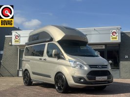 Westfalia Ford Nugget automaat buscamper hoogdak 131 pk bovenbed en slaapbank airco camera cruise ctr pdc v/a lmv 18 inch zonnepaneel 1e eigenaar