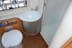 Adria Coral S 670 SLT , Halve-dinette, zijbank ,  2 draaistoelen, enkele-bedden- laag , airco, Bj. 2010 Marum ( Groningen ) foto: 35