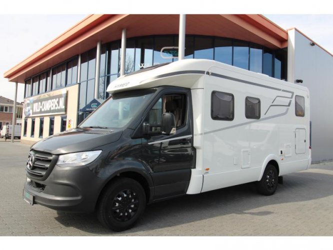 Hymer Tramp 680 S Lits simples - 9tr. photo de voiture : 1