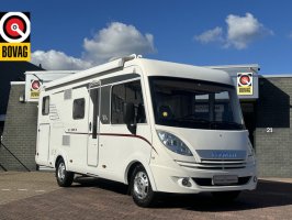 Hymer EX 578 150 pk org nl camper nap logisch euro 5 enkele bedden+hefbed luifel grote garage elktr schotel 2x tv camera oven