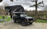 Other 4 pers. Jeep Cherokee met Yuna Family daktent camper huren in Meerssen? Vanaf € 61 p.d. - Goboony foto: 1