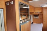 Adria Coral S 670 SLT , Halve-dinette, zijbank ,  2 draaistoelen, enkele-bedden- laag , airco, Bj. 2010 Marum ( Groningen ) foto: 21