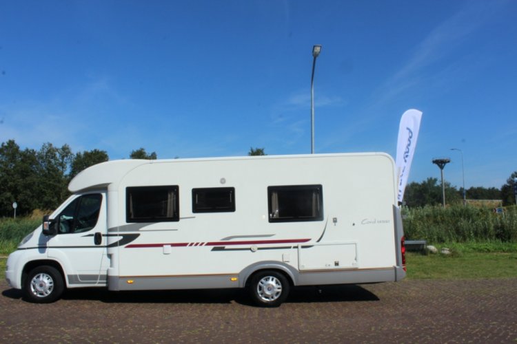 Adria Coral S 670 SLT , Halve-dinette, zijbank ,  2 draaistoelen, enkele-bedden- laag , airco, Bj. 2010 Marum ( Groningen ) foto: 39