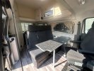 Westfalia Ford Nugget plus automaat buscamper hoogdak 131 pk bovenbed en slaapbank airco camera cruise ctr pdc v/a lmv 18 inch zonnepaneel 1e eigenaar foto: 11