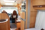 Adria Coral S 670 SLT , Halve-dinette, zijbank ,  2 draaistoelen, enkele-bedden- laag , airco, Bj. 2010 Marum ( Groningen ) foto: 10