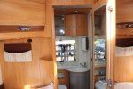 Adria Coral S 670 SLT , Halve-dinette, zijbank ,  2 draaistoelen, enkele-bedden- laag , airco, Bj. 2010 Marum ( Groningen ) foto: 32